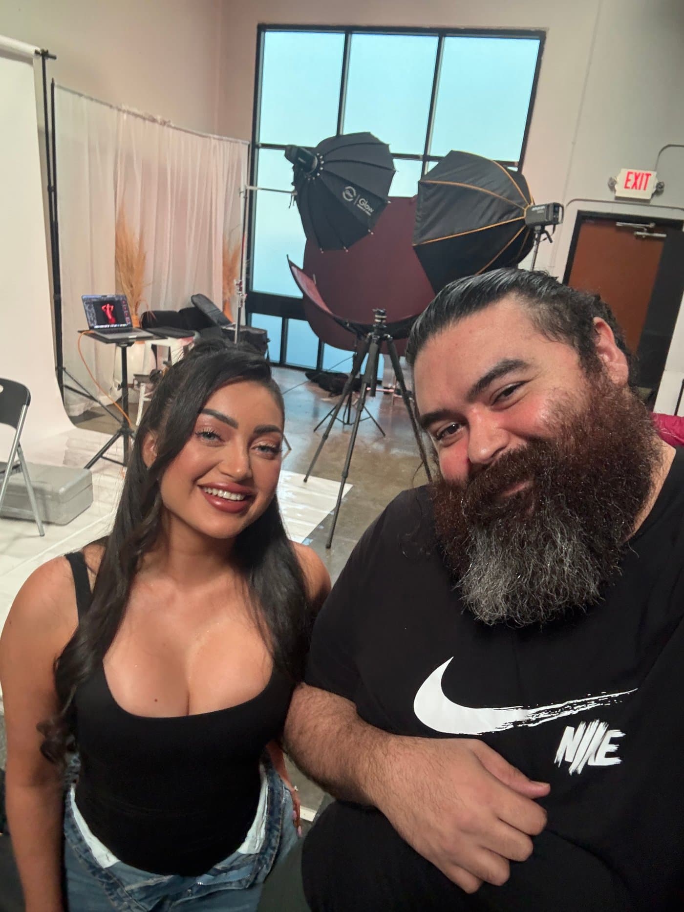 Jose Lara with a boudoir client in the studio